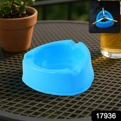 Oblivion Plastic Ashtray in an outdoor patio setting