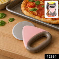 Close-up of rotating blade pizza cutter