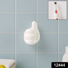 Close-up of white palm-shaped multifunctional clip