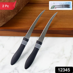 Close-up of serrated stainless steel knife blade
