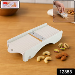Close-up of ginger cutting tool by Liger