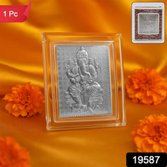 Close-up of intricate silver-plated Lord Ganesha photo frame detailing