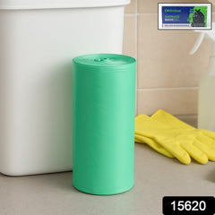Rolled biodegradable green trash bags displayed on white background.