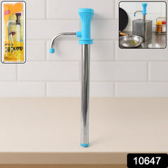Supermom Manual Oil Pump Dispenser in use, pouring oil