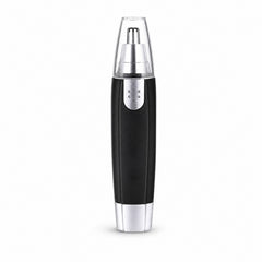 Battery-operated ear and nose hair trimmer in hand