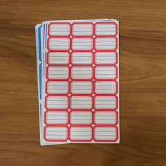 Backing of a writable label sticker showing strong adhesive