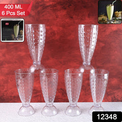 Set of six transparent plastic milkshake glasses