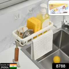 Kitchen sink organizer with sponges, brush & dishcloth on adhesive hook