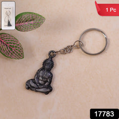 Close-up of Hanuman Ji idol on metal keychain