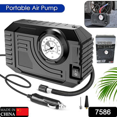 Close-up of portable tire inflator showing dial gauge & hose