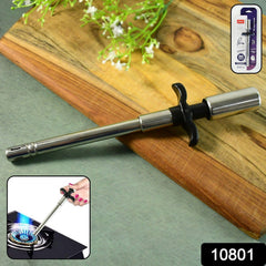 Gas stove lighter held over burner