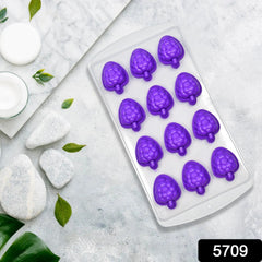 Close-up of fruit-shaped silicone ice cubes from the tray