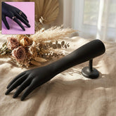 Black hand-shaped jewelry display stand front view