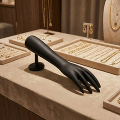 Black hand-shaped display holder side angle