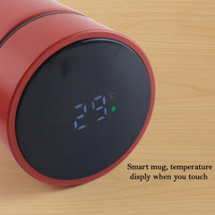 Red vacuum insulated water bottle side view