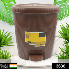 Mini plastic pedal dustbin inside a car