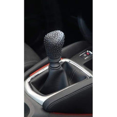 Gear shift knob with protective silicone cover
