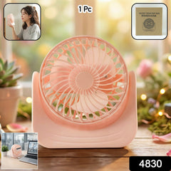Compact silent mini desk fan on a modern wooden desk