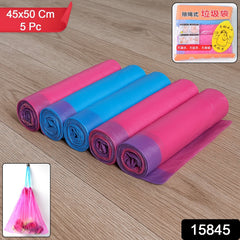 Disposable biodegradable garbage bag rolls on kitchen counter