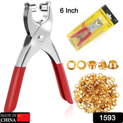 Close-up of grommet setting tool pliers with gold eyelets