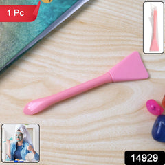 Facial mask applicator spatula angled view