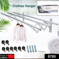 Extended clothes drying rack with towels and clothes hanging