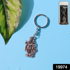 Close-up of Radha Krishna metal keychain, front view