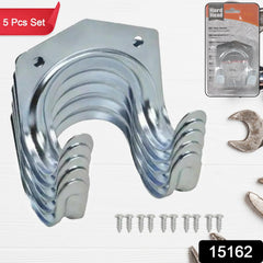 Close-up of black heavy-duty tool hanger hooks mounted on a white wall