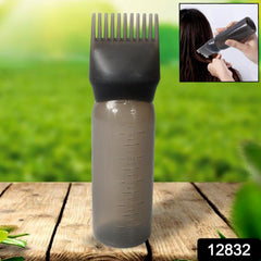 Close-up of comb applicator brush with pump handle