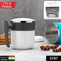 Insulated coffee mug with lid & ergonomic handle.