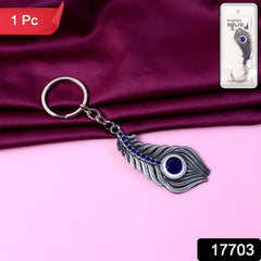 Crystal adorned peacock feather keychain