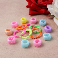 Pastel hairbands and crown clips displayed on a white background