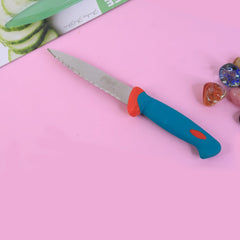 Supermom paring knife held over cutting board