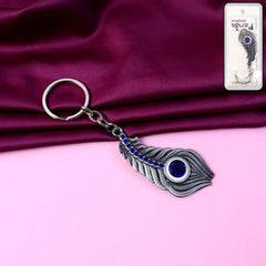 Elegant metal peacock feather keychain with blue gem