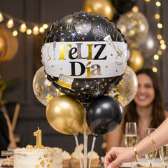 Shiny black gold balloon festive