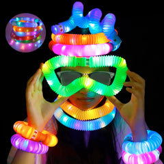 Kids playing with colorful stretch fidget tubes