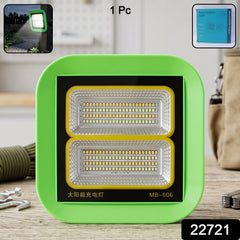 Portable LED flood light in outdoor setting showing three colour modes