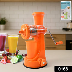 Close up view of manual juicer parts and juice cup