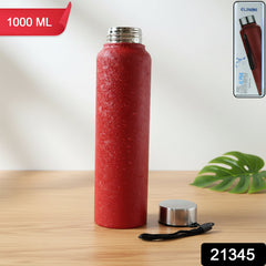 Red water bottle angled side view