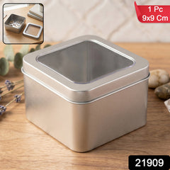Close-up of metal tin box with transparent window lid for jewelry and crafts