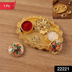 Golden Ganesh pooja accessory with detailed scalloped border