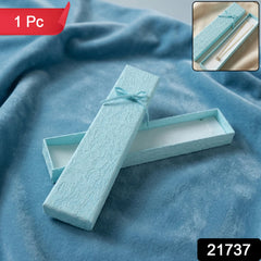 Jewelry gift box displayed with ribbon tied