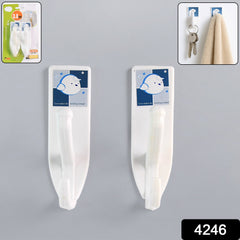 Side view of adhesive wall hooks with various household items hanging