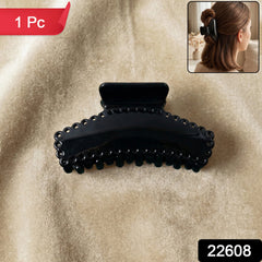 Black hair claw clip shown on a clean background