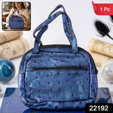 Mini zipper handbag in metallic blue ostrich pattern with dual handles and front zip pocket