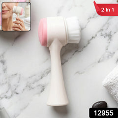 Close-up of dual-sided facial cleansing brush showing soft bristle and silicone scrubber