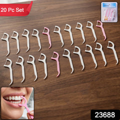Close-up of a dental floss pick with nylon floss between teeth for oral hygiene