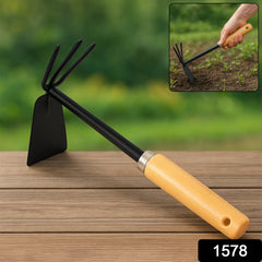 Close-up of carbon steel gardening hoe and cultivator with wooden handle