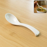 Plastic soup spoon with deep bowl and ergonomic handle