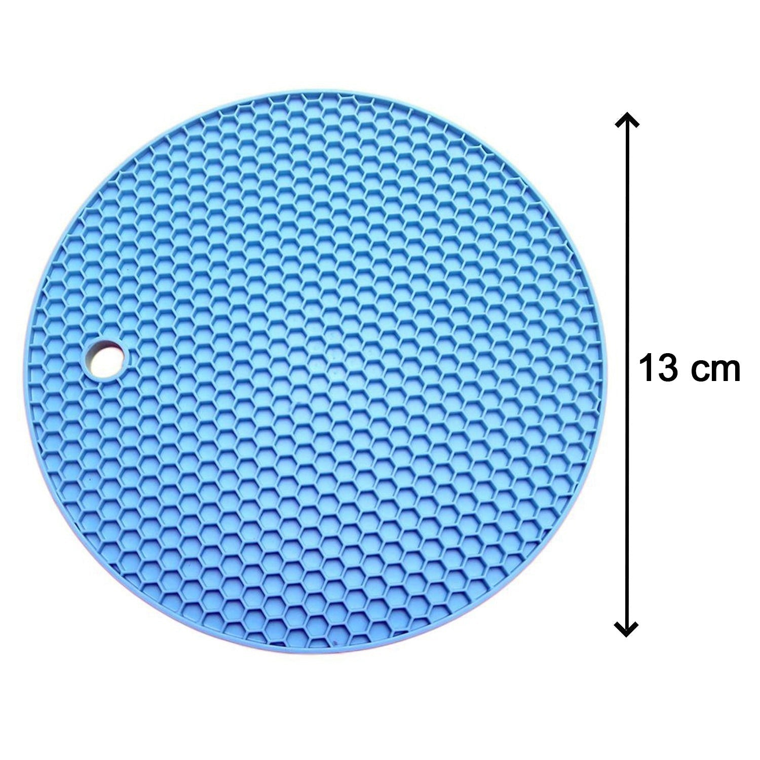 Flexible silicone trivet protecting surfaces from heat